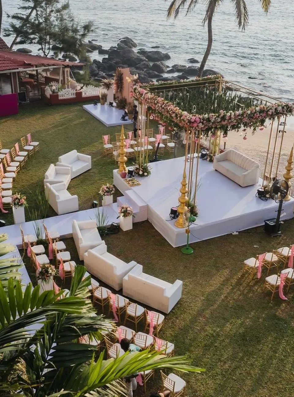 Luxury Goa beach destination wedding setup by Lotus Grandeure with floral mandap and oceanfront ceremony decor