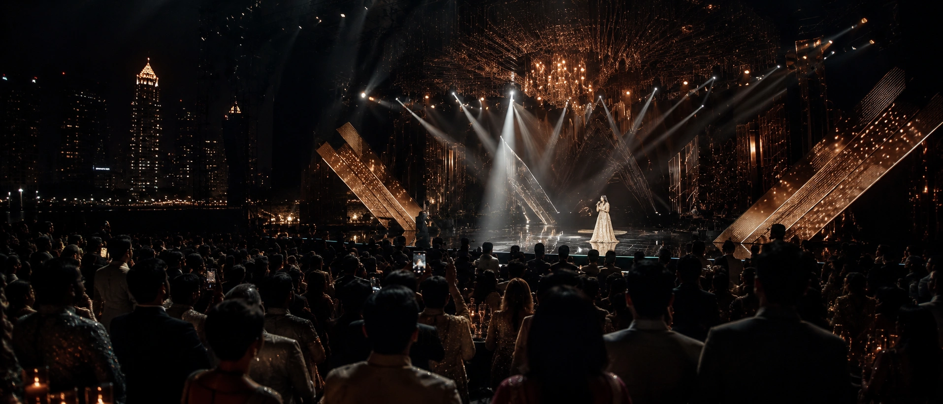Dramatic cinematic spotlight stage setup for a luxury celebrity event in India, featuring theatrical lighting design, premiere-style ambiance, and red carpet grandeur crafted by Lotus Grandeure for high-profile clientele.